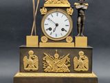 a clock that is sitting on top of a table