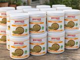 six jars of monteroso cereal sitting on a wooden table