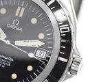 a watch that is sitting on a white surface
