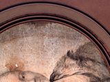 a picture of a painting of a woman kissing a cat