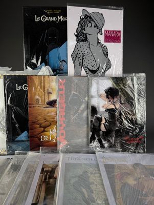 a lot of books that are sitting on a table