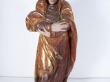 an image of a statue of a woman holding a child