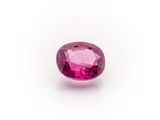 a pink tourmaline gems on a white background
