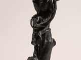an image of a statue of a man holding a baseball bat