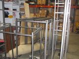 a room with a lot of metal frames in it