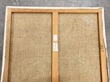 an image of a picture of a wooden frame on a floor