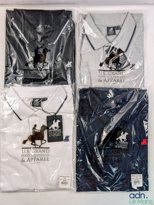 three t - shirts with logos on them sitting on a table