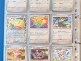 a close up of a binder with a bunch of pokemon cards on it