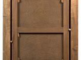 a close up of a picture of a wooden frame with a window