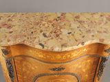 a small table with a marble top on it