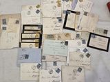 a lot of old letters and envelopes on the table
