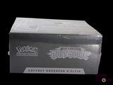 a box of pokemon trading cards on a black background