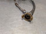 a close up of a hose on a metal surface