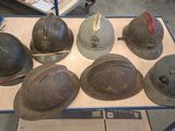 many helmets that are on a cart in the warehouse