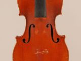 an old violin with a bow on a white background