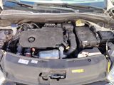 the engine of a car with its hood open and the hood open
