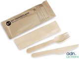 three forks and two spoons in a brown paper bag