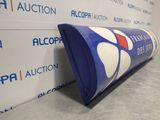 an image of a roll of blue and white paper next to a stack of white and blue boxes