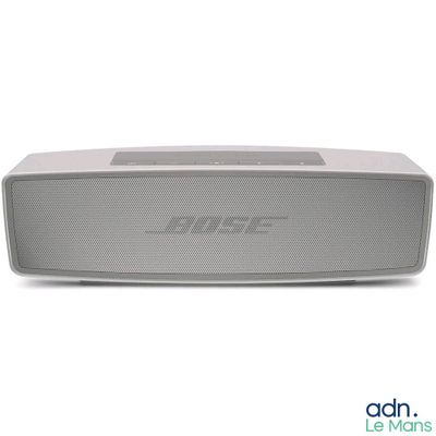 a close up of a speaker on a white surface