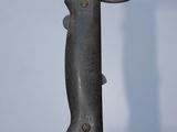 a close up of a knife on a table