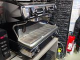a kitchen with a bunch of appliances on the counter