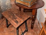 a small table with a book on it in a living room