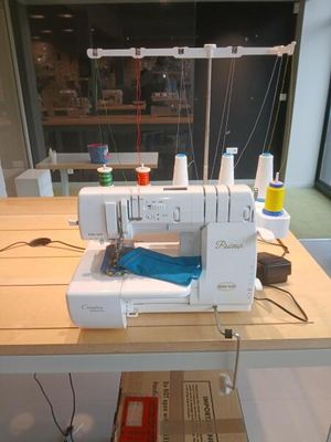a sewing machine that is sitting on a table