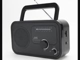 une radio noire posée sur une surface blanche