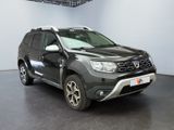 a picture of a black dacia parked in a garage