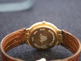 a watch that is sitting on top of a table