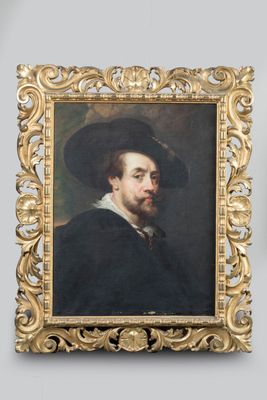 portrait d'un homme coiffé d'un chapeau noir, dans un cadre doré