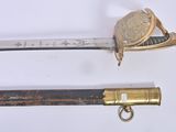 two swords that are laying side by side on a white surface