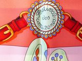 a picture of a colorful scarf with a clock on it