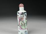 a white and pink glass snuff bottle with a painting on it