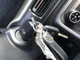 a car key that is attached to a car key holder