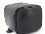 black leather cosmetic bag on white background with clippings