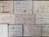 many old letters that are on the table together