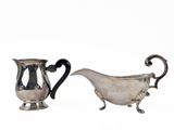 pair of silver plated sugar and creamers on stand