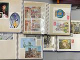 a lot of stamps on the pages of a book