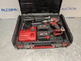 an image of a tool box with tools in it on a table
