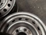 two rims that are sitting on a table