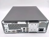 the back view of a computer with a hard drive on top of it