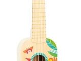 a close up of a small wooden guitar with a bird on it