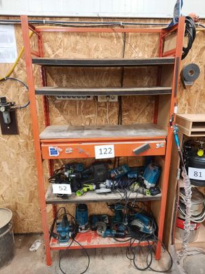 a shelf with tools on it in a garage