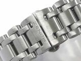 a close up of a watch bracelet on a white surface