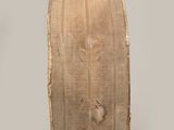 an image of a large wooden object on a white surface