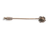 an image of a pin with a flower on it