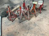 a lot of tools sitting on the floor in a garage