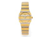 une montre-bracelet pour femme en acier inoxydable bicolore et or jaune