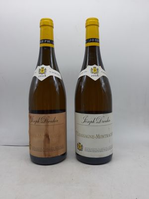 deux bouteilles de vin posées l'une à côté de l'autre sur une table